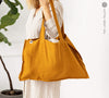 Amber yellow linen tote bags designed and made for long, comfortable and sustainable use.