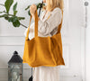 Amber yellow linen tote bags designed and made for long, comfortable and sustainable use.