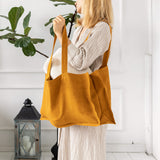 Amber yellow linen tote bags designed and made for long, comfortable and sustainable use.