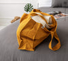Amber yellow linen tote bags designed and made for long, comfortable and sustainable use.