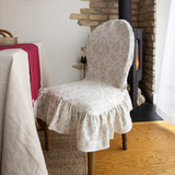 Our royal floral pattern linen chair slipcovers offer both practicality and aesthetic appeal.