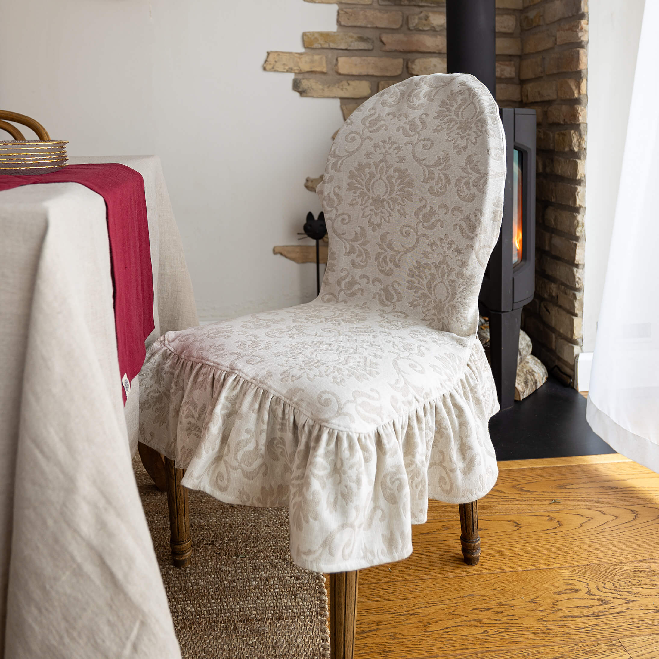 Our royal floral pattern linen chair slipcovers offer both practicality and aesthetic appeal.