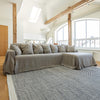 Our rustic unbleached linen sectional couch cover a stylish way to change up the look of the room. Plus, linen has natural properties that make it resistant to stains and easy to clean, which adds to its appeal for everyday use.