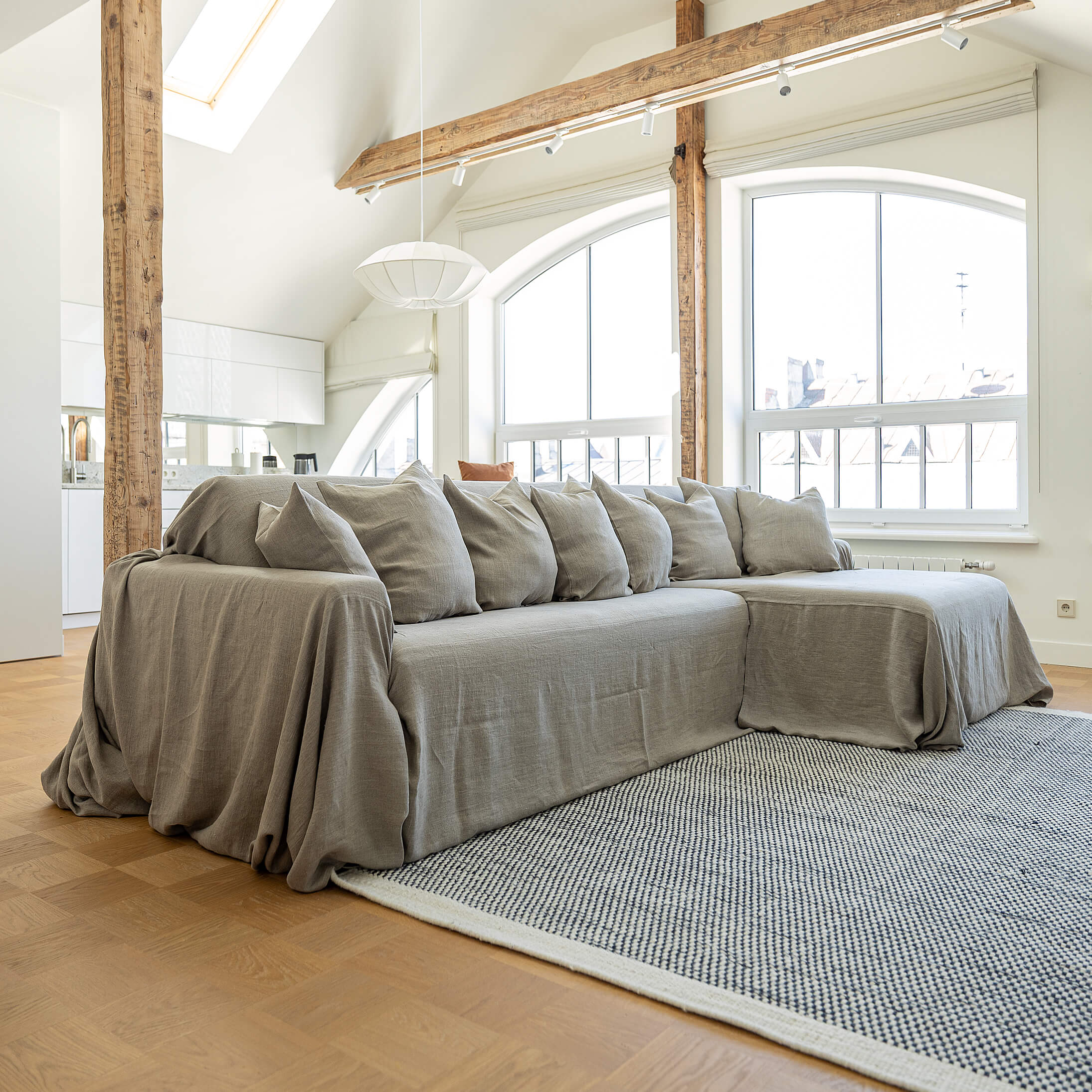Our rustic unbleached linen sectional couch cover a stylish way to change up the look of the room. Plus, linen has natural properties that make it resistant to stains and easy to clean, which adds to its appeal for everyday use.