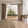 Lined rustic unbleached linen curtains with lining, designed and made to provide maximum protection from the sun and heat coming through the window.