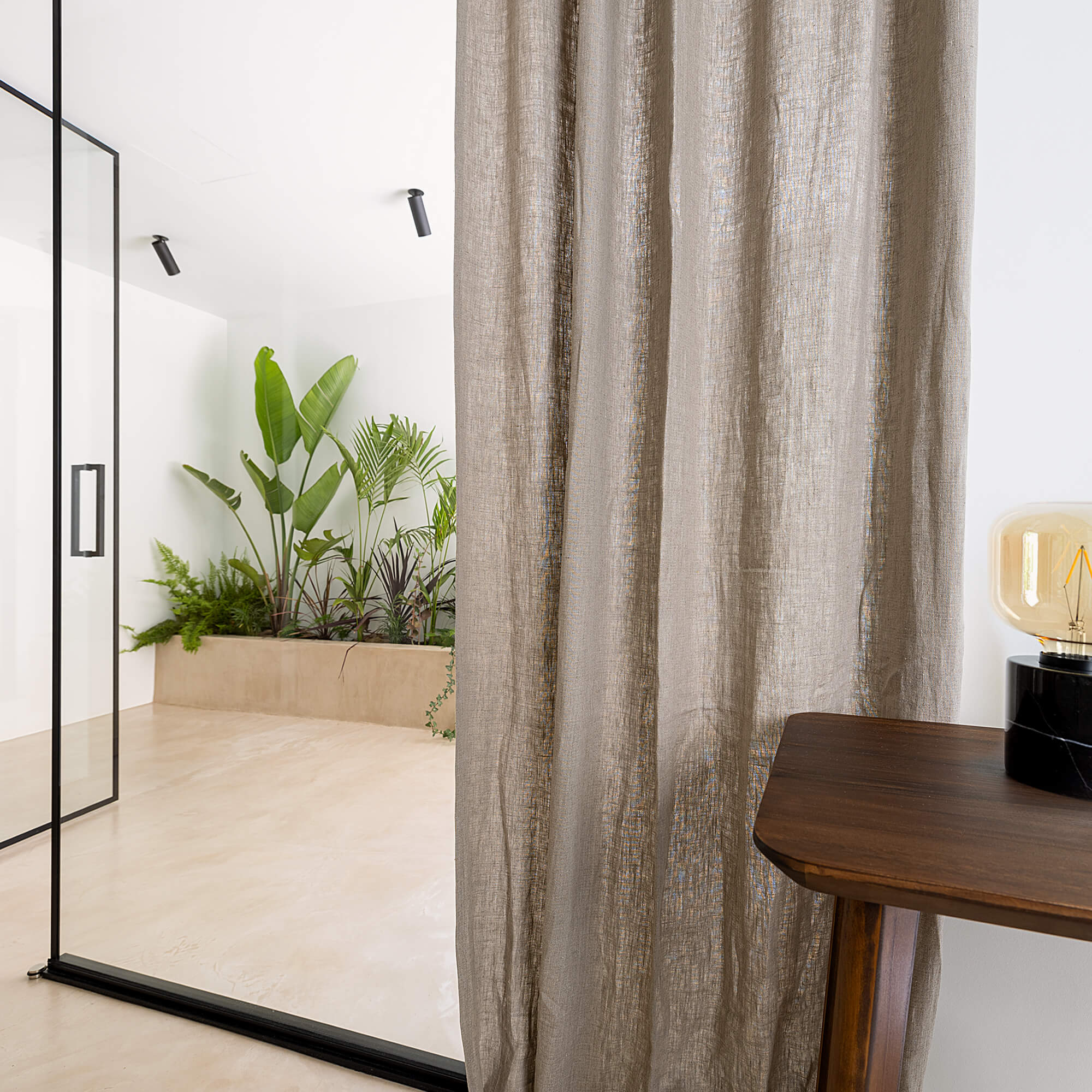 Lined rustic unbleached linen curtains with lining, designed and made to provide maximum protection from the sun and heat coming through the window.