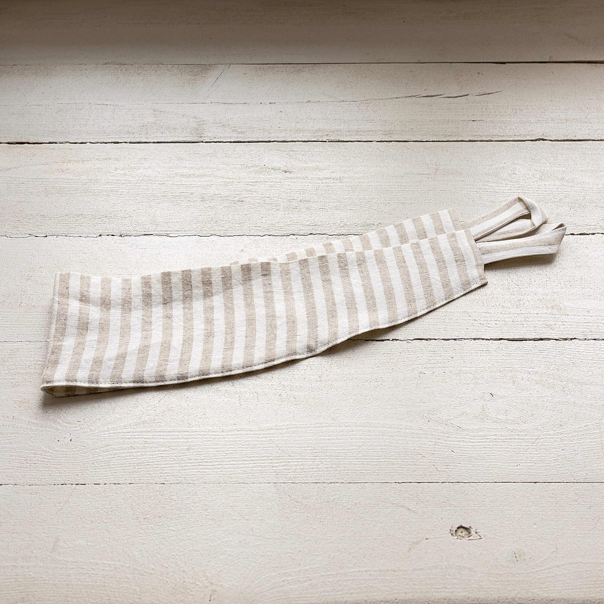 Our striped linen curtain tie-back is the perfect solution for keeping your curtains looking neat and stylish. Made from the highest-quality European linen, they offer durability and a luxurious feel.