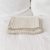 Linen flat sheet, elegantly striped in white and natural tones.
Crafted for the modern bedroom, these sheets offer unparalleled softness and breathability, ensuring a comfortable night's sleep year-round.