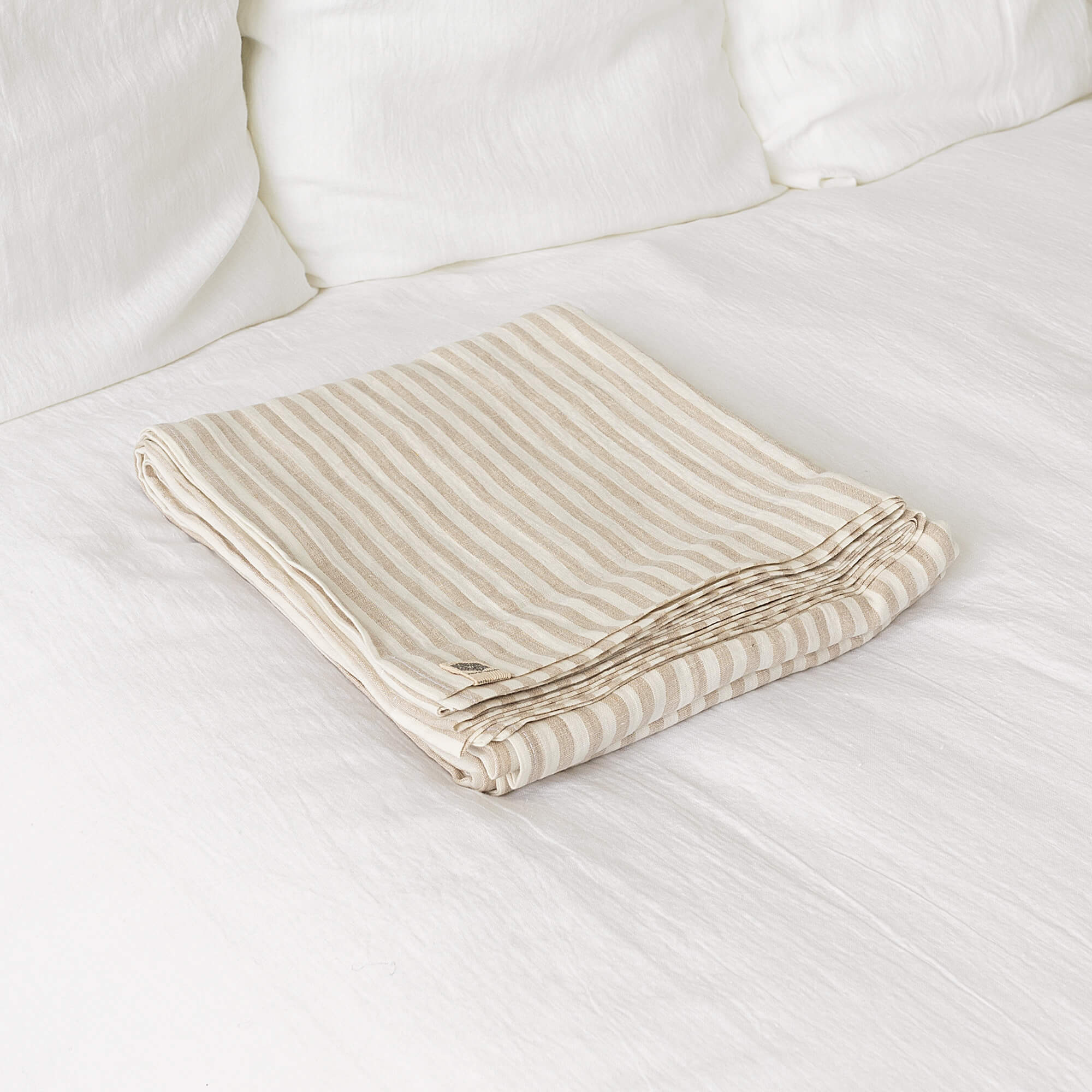 Linen flat sheet, elegantly striped in white and natural tones.
Crafted for the modern bedroom, these sheets offer unparalleled softness and breathability, ensuring a comfortable night's sleep year-round.