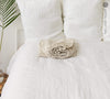 Delicately striped in a harmonious blend of white and natural hues.