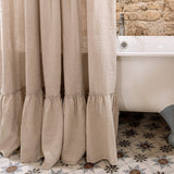 Our tie top natural unbleached linen shower curtains with ruffles are designed and made to give your home a unique and timeless charm, and no matter the style of your home, linen can fit into any interior.