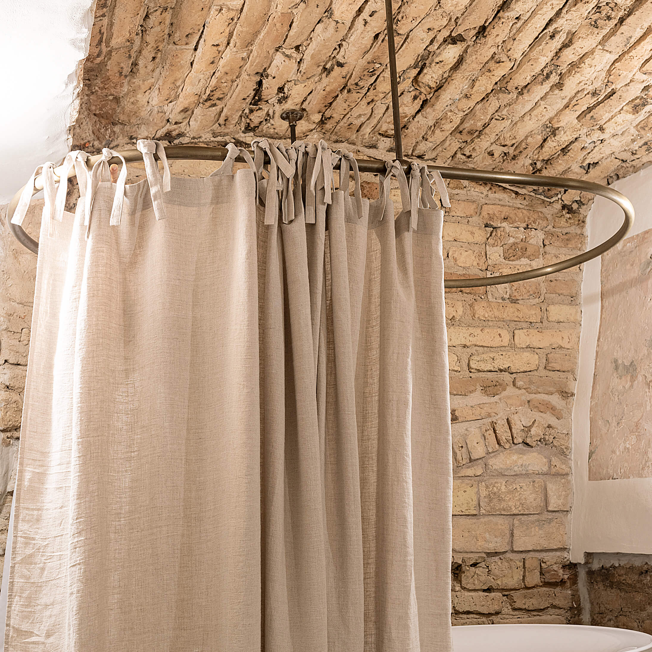 Our tie top natural unbleached linen shower curtains with ruffles are designed and made to give your home a unique and timeless charm, and no matter the style of your home, linen can fit into any interior.