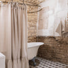 Our tie top natural unbleached linen shower curtains with ruffles are designed and made to give your home a unique and timeless charm, and no matter the style of your home, linen can fit into any interior.