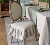 Our rustic unbleached linen slipcovers offer both practicality and aesthetic appeal.