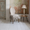 Our rustic unbleached linen slipcovers offer both practicality and aesthetic appeal. The covers will protect dining chairs from spills and stains, also enhance the visual appeal of your space with their timeless natural style.