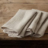Introducing our unbleached linen napkins set, designed to elevate your dining experience with a touch of warmth and charm.