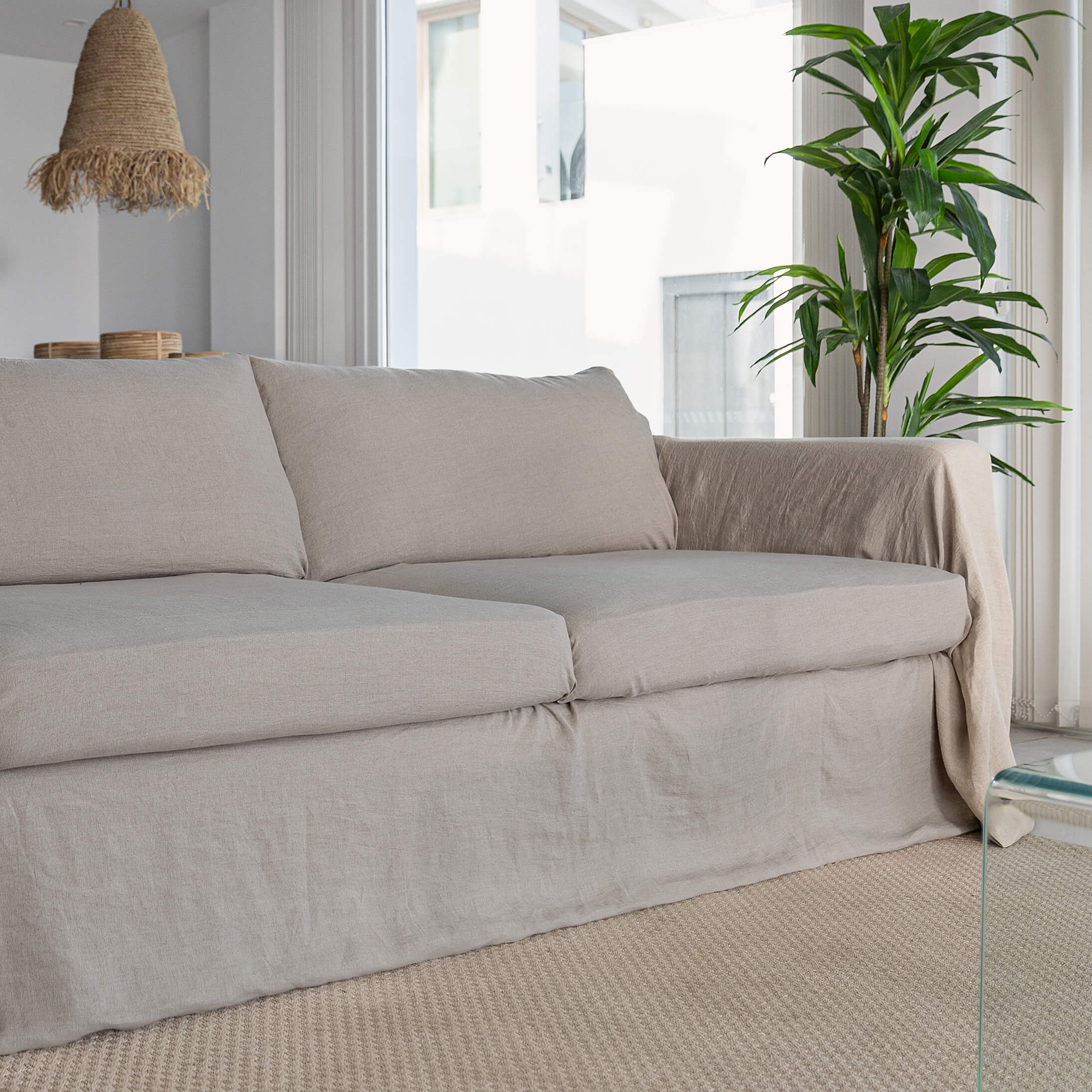 This natural linen cover enhance your decor, but it also serves as a shield against the playful antics of your beloved pets, safeguarding your couch from any potential damage.