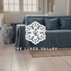 Ocean blue linen couch cover designed and crafted to elevate your interior with a fresh look and great energy. It offers a practical solution for safeguarding your furniture against the playful antics of your beloved pets. 
