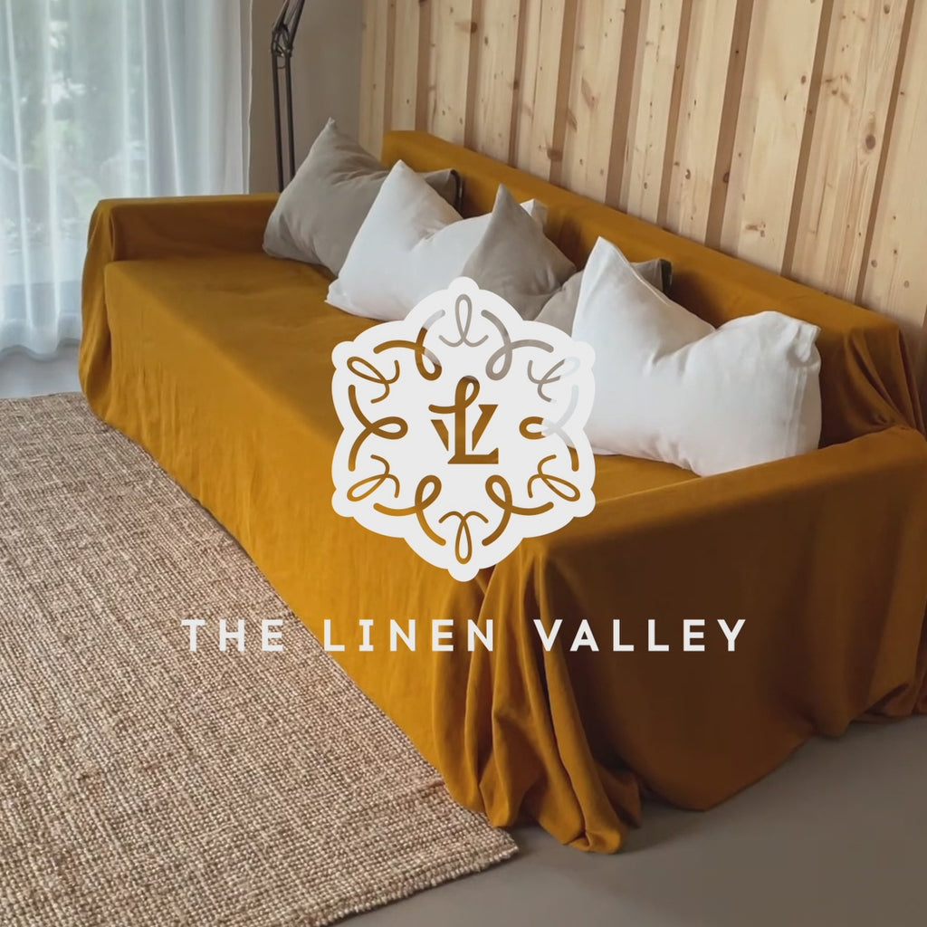 Introducing our Amber Yellow linen couch cover, crafted to enhance the beauty and functionality of your sofa. Designed to shield your couch from daily spills and stains, this cover offers both practicality and elegance.