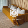 Introducing our Amber Yellow linen couch cover, crafted to enhance the beauty and functionality of your sofa. Designed to shield your couch from daily spills and stains, this cover offers both practicality and elegance.