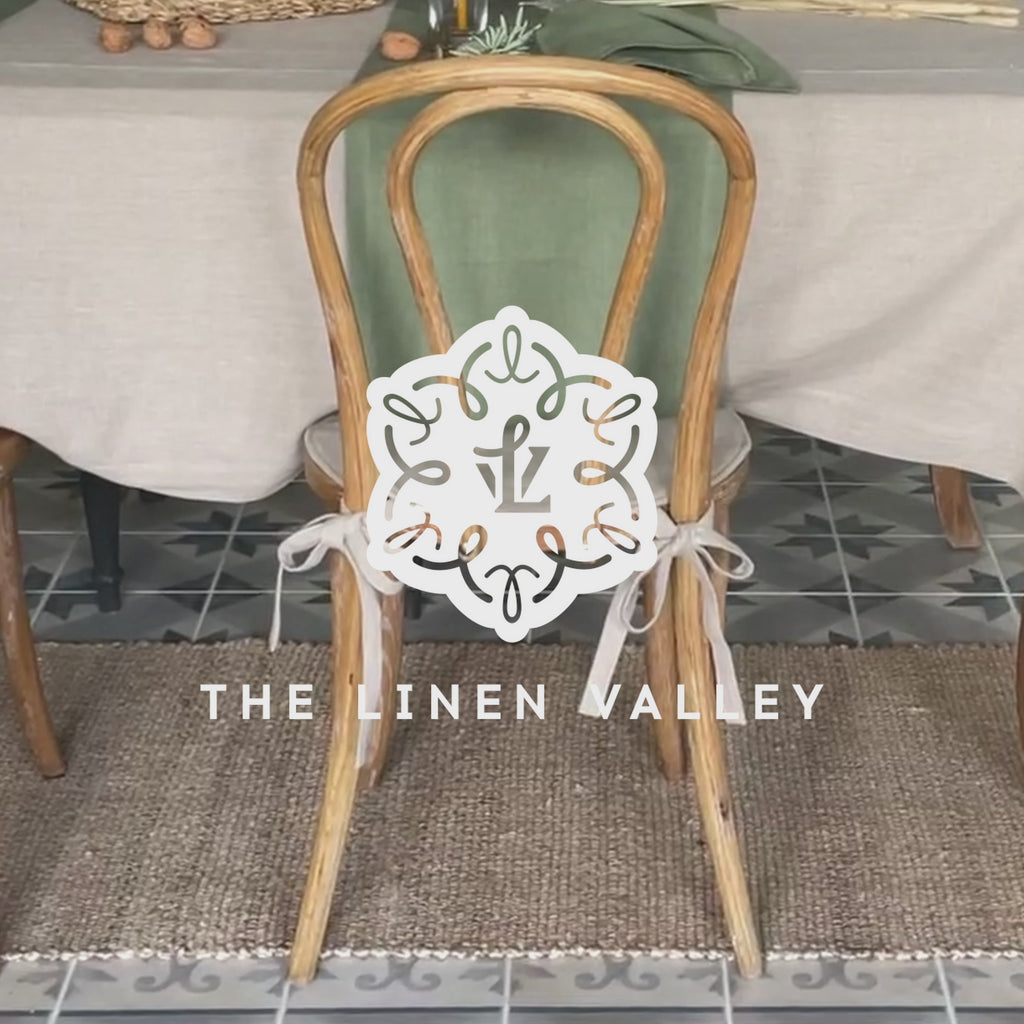 Say goodbye to worrying about stains or scratches, and hello to a beautifully refreshed chair that's both inviting and protected. Natural Linen chair cover with soft padding inside.