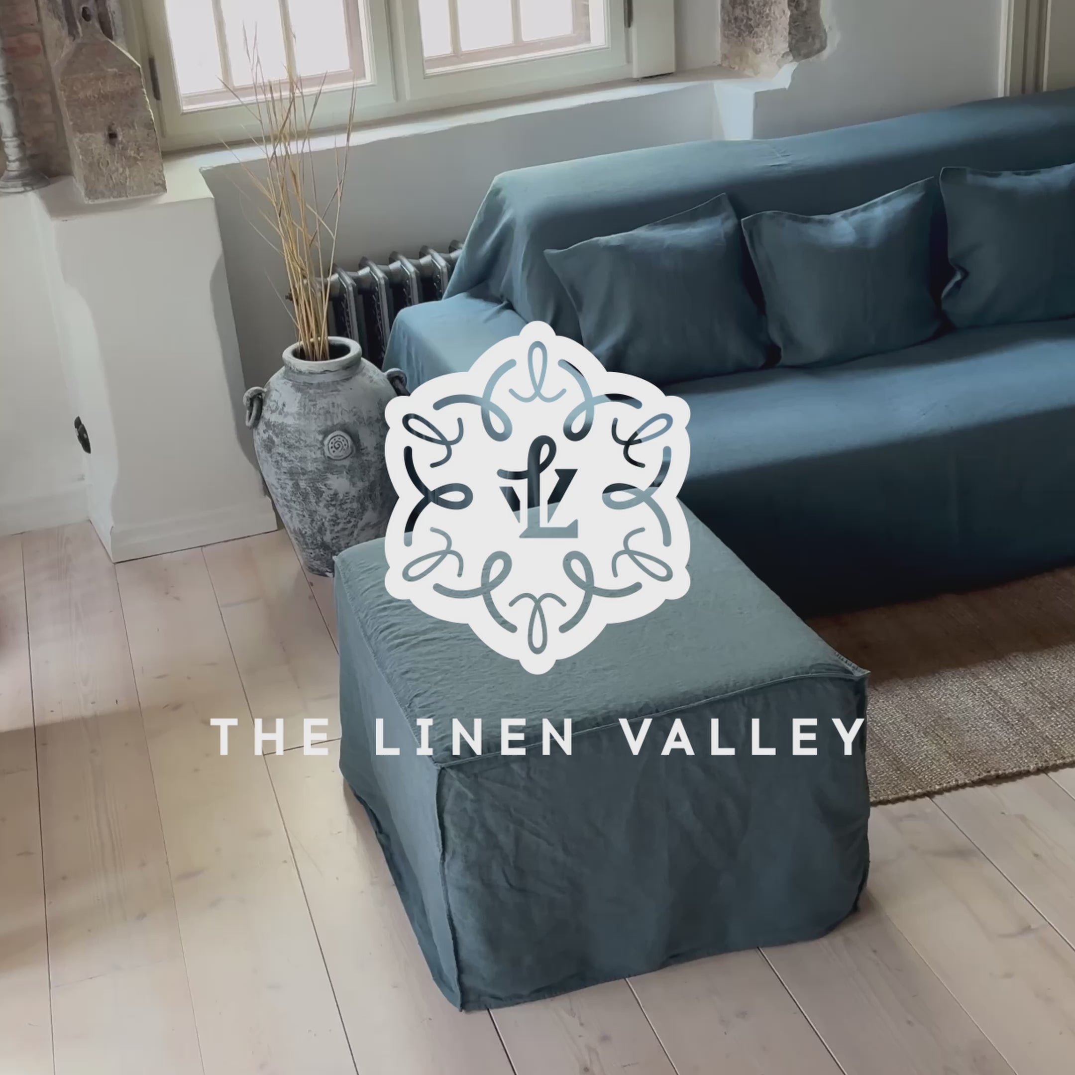Ocean blue linen couch cover designed and crafted to elevate your interior with a fresh look and great energy. It offers a practical solution for safeguarding your furniture against the playful antics of your beloved pets.