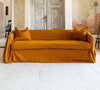 Introducing our Amber Yellow linen couch cover, crafted to enhance the beauty and functionality of your sofa. Designed to shield your couch from daily spills and stains, this cover offers both practicality and elegance.