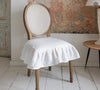 Our Antique white linen slipcovers offer both practicality and aesthetic appeal. The covers will protect dining chairs from spills and stains, also enhance the visual appeal of your space with their timeless natural style. Slipcovers will simply change your chairs' appearance and provide an elegant solution.
