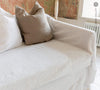 Introducing our Antique White linen couch covers, meticulously crafted to enhance the beauty and functionality of your sofa. Designed to shield your couch from daily spills and stains, these covers offer both practicality and elegance.