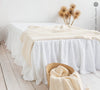 Introducing our optical white linen bed valance, the perfect addition to complete your bedding ensemble.