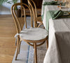 Say goodbye to worrying about stains or scratches, and hello to a beautifully refreshed chair that's both inviting and protected. Natural Linen chair cover with soft padding inside.